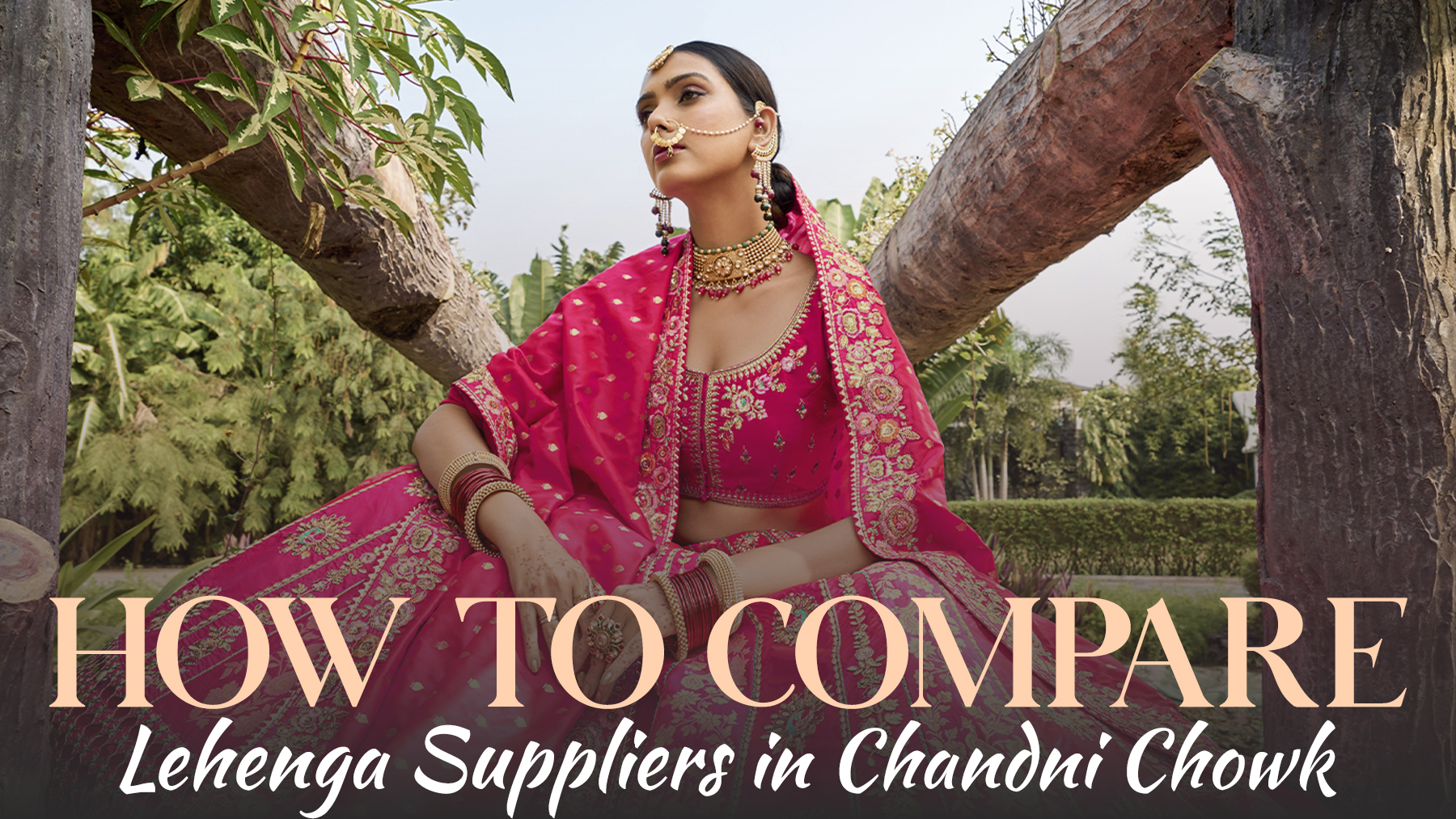 Lehenga Suppliers in Chandni Chowk guide featuring a woman wearing a pink bridal lehenga with detailed embroidery and traditional bridal jewelry.